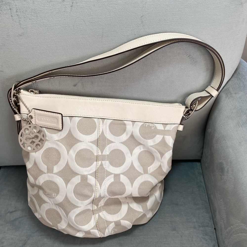 NWOT Coach adjustable shoulder, tote in cream canvas and leather ,lined in green